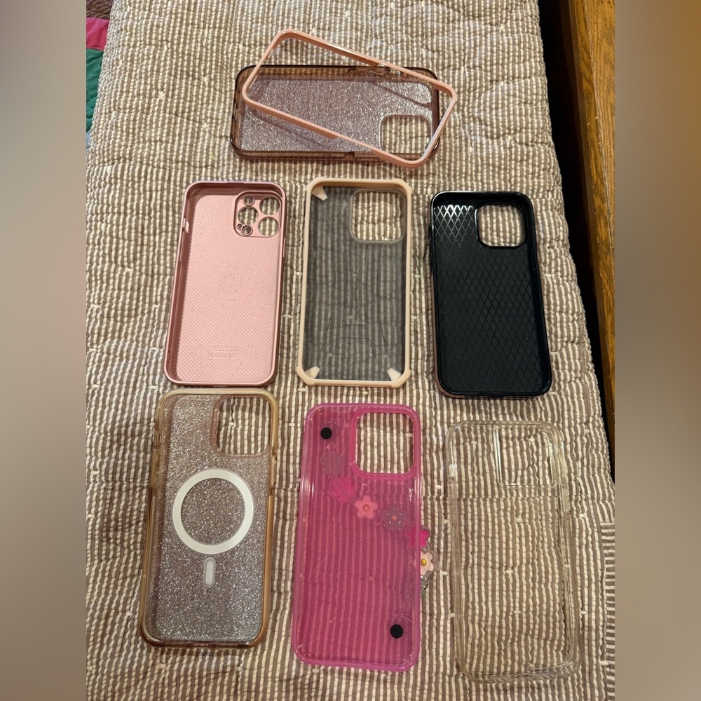 iPhone 13 ProMax cases. Two of them are Kate Spade NY. One is a wallet case.